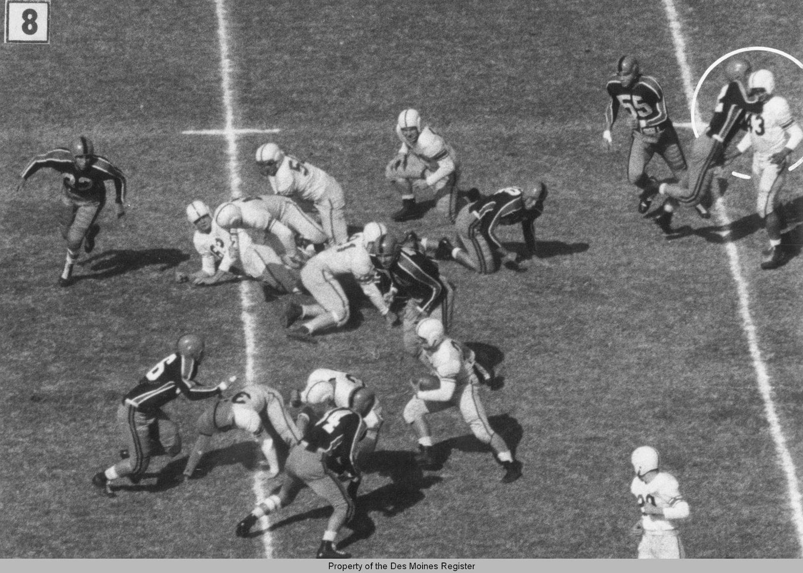 The premeditated, racially-motivated, jaw-breaking punch Oklahoma A & M defensive lineman Wilbanks Smith delivered on defenseless Drake quarterback Johnny Bright – an assault that happened away from the action after Bright had handed the ball to his running back in the October 20, 1951 game in Stillwater, Oklahoma – was captured on film (as were two other cheap shot hits on Bright that knocked him unconscious) by Des Moines Register photographers John Robinson and Doug Ultang. A six-photo sequence of the assaults ran across the top of the Des Moines sports page the next day and was picked up and run in newspapers across the nation as well as being featured in Life and Look magazines. Robinson and Ultang won the Pulitzer Prize in 1952 for their photos.  JOHN ROBINSON AND DOUG ULTANG / DES MOINES REGISTER AND DRAKE UNIVERSITY