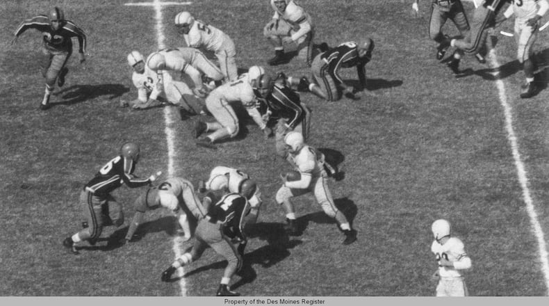 The premeditated, racially-motivated, jaw-breaking punch Oklahoma A & M defensive lineman Wilbanks Smith delivered on defenseless Drake quarterback Johnny Bright – an assault that happened away from the action after Bright had handed the ball to his running back in the October 20, 1951 game in Stillwater, Oklahoma – was captured on film (as were two other cheap shot hits on Bright that knocked him unconscious) by Des Moines Register photographers John Robinson and Doug Ultang. A six-photo sequence of the assaults ran across the top of the Des Moines sports page the next day and was picked up and run in newspapers across the nation as well as being featured in Life and Look magazines. Robinson and Ultang won the Pulitzer Prize in 1952 for their photos. JOHN ROBINSON AND DOUG ULTANG / DES MOINES REGISTER AND DRAKE UNIVERSITY