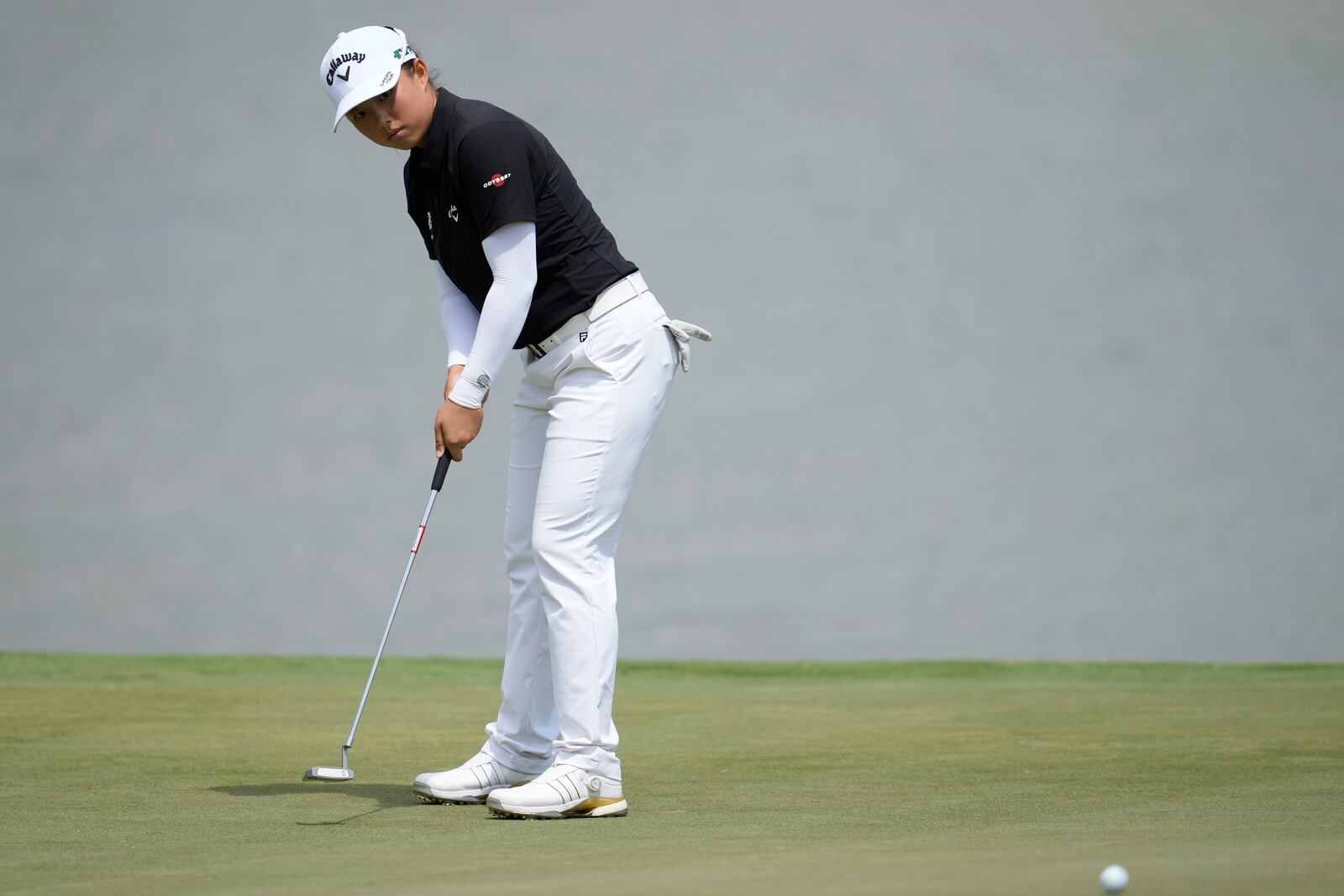 Ruoning Yin, of China, putts on the third green during the final round of the Chevron Championship LPGA golf tournament Sunday, April 27, 2025, in The Woodlands, Texas. (AP Photo/Ashley Landis)