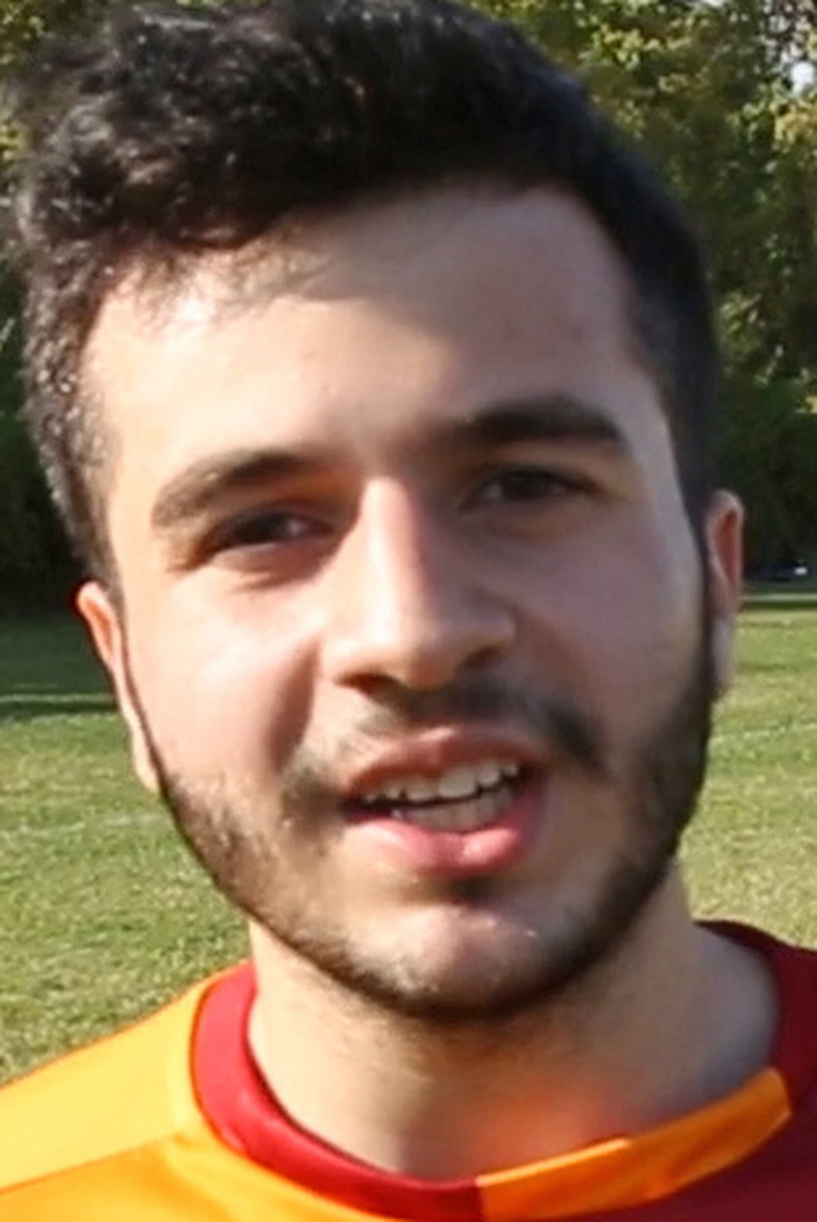 Mustafa Iskandarov, from Russia, graduated from Belmont High School and helps coach the Boys Soccer Team. TY GREENLEES / STAFF