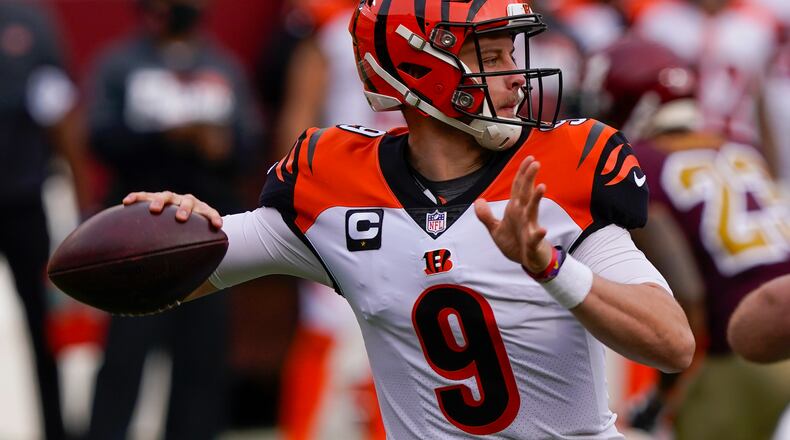 Cincinnati Bengals quarterback Joe Burrow (9) throwing the ball during the first half of an NFL football game against the Washington Football Team, Sunday, Nov. 22, 2020, in Landover. (AP Photo/Susan Walsh)