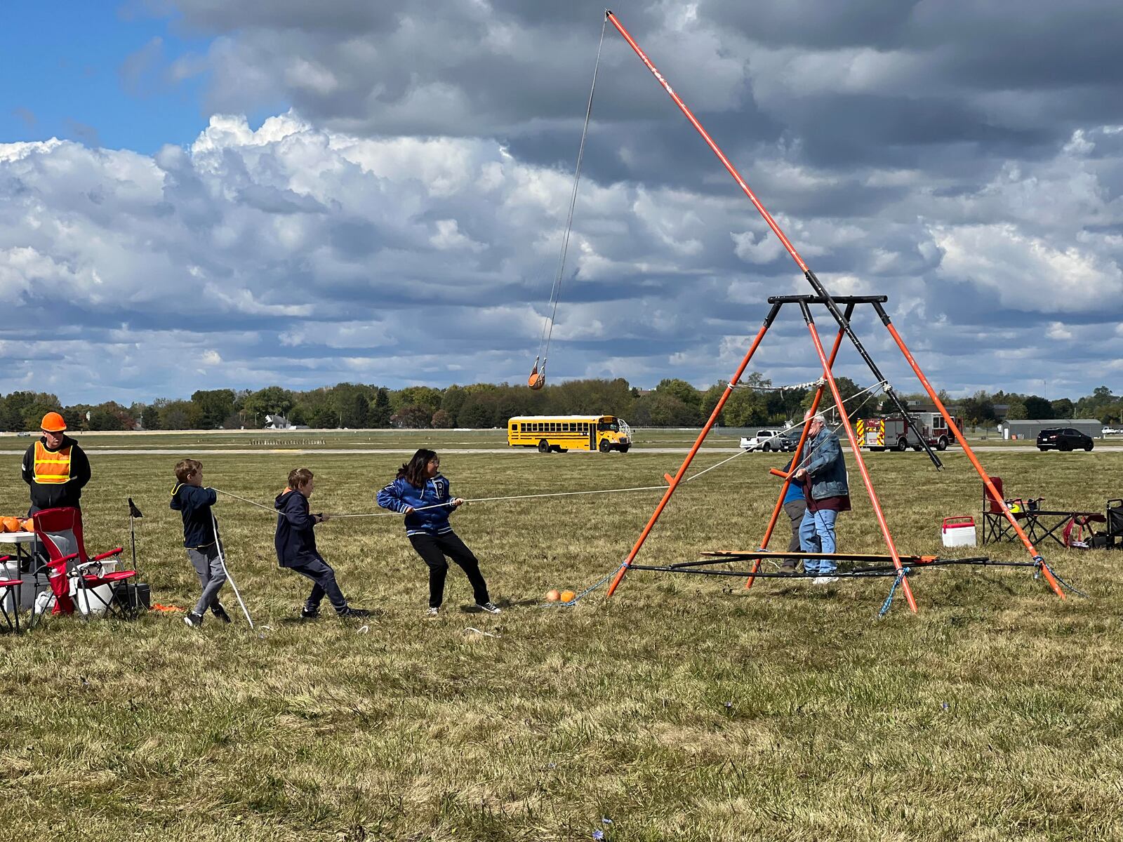 A novice team of young participants makes a valiant effort during Saturday's pumpkin chuck event. AIMEE HANCOCK/STAFF