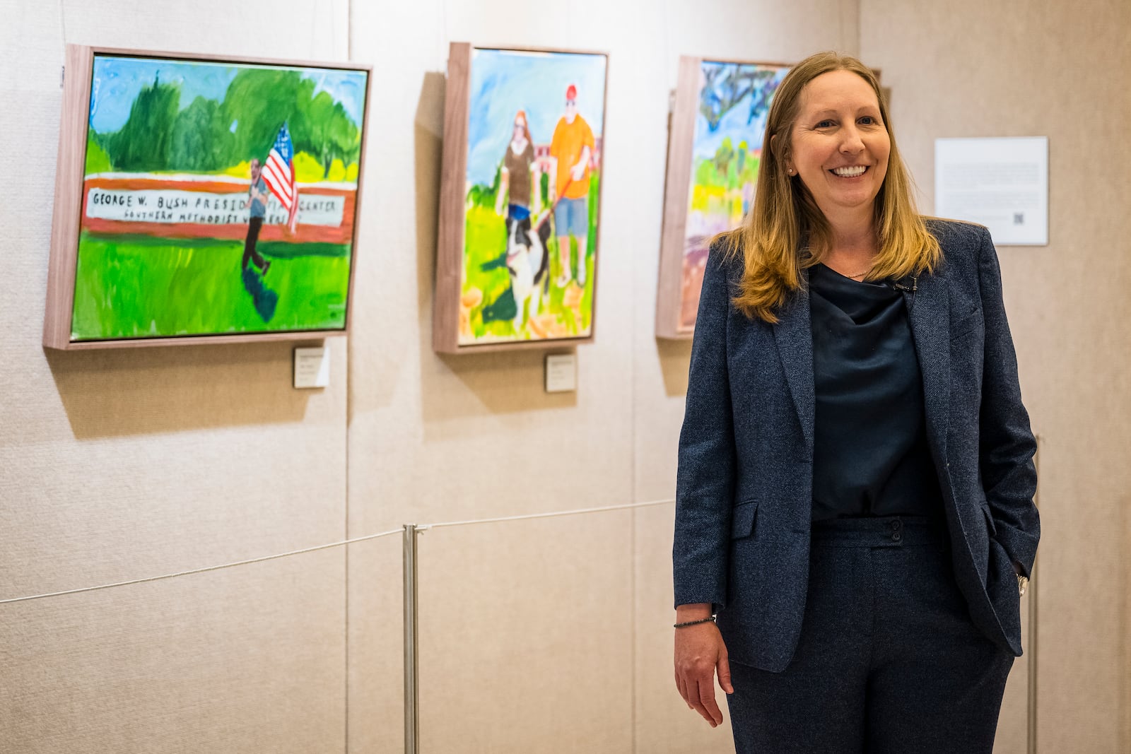 Teresa Lenling, Director of the George W. Bush Presidential Museum, speaks during an interview at an exhibit featuring paintings by President George W. Bush on Thursday, May 15, 2025, in Dallas. (AP Photo/Jessica Tobias)