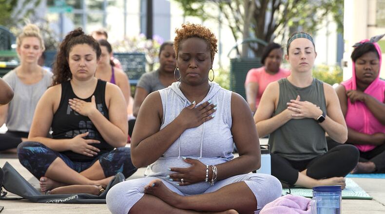 Yoga can help you slow down and feel better. CONTRIBUTED