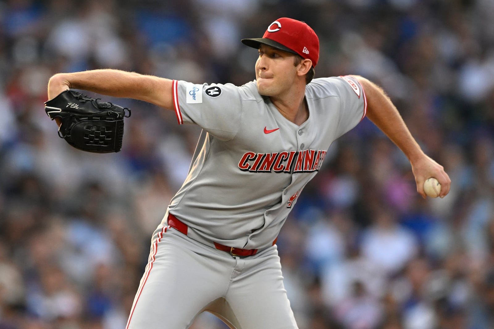 Cincinnati Reds starter Nick Lodolo delivers a pitch during the first inning of a baseball game against the Chicago Cubs Monday, Aug. 4, 2025, in Chicago. (AP Photo/Paul Beaty)