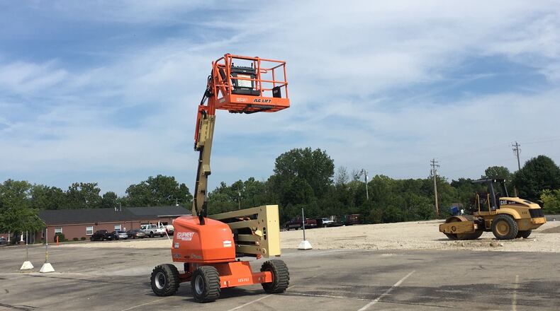All the buildings comprising the Springboro IGA shopping center are gone. The city of Springboro has picked an architect, engineer, developer and construction company to redevelop the site. STAFF / LAWRENCE BUDD