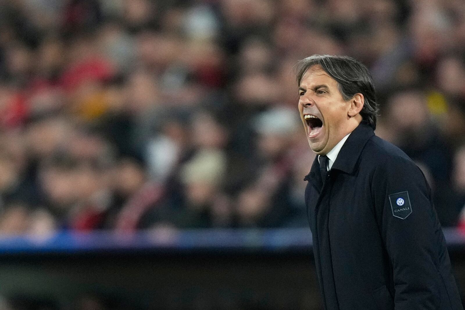 Inter Milan's head coach Simone Inzaghi reacts during the Champions League quarterfinals first leg soccer match between FC Bayern Munich and Inter Milan, at the Allianz Arena in Munich, Germany, Tuesday, April 8, 2025. (AP Photo/Matthias Schrader)