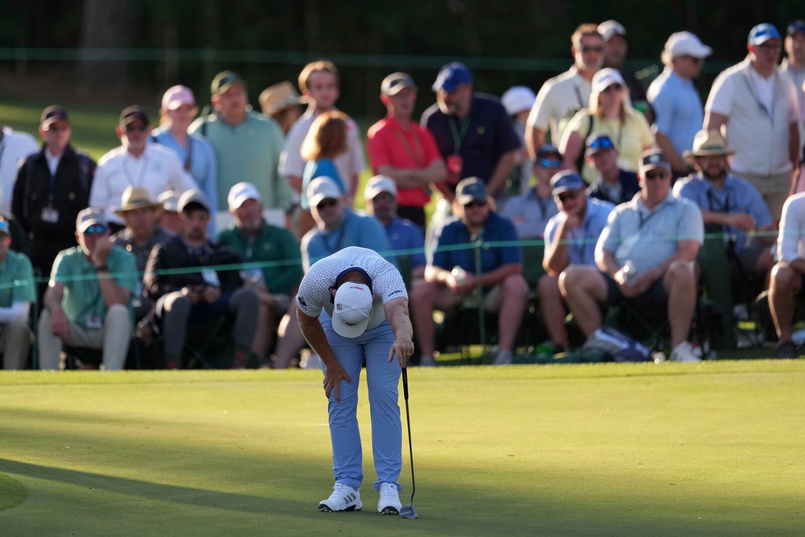 Tyrrell Hatton, of England, reacts after missing a putt on the 17th hole during the second round at the Masters golf tournament, Friday, April 11, 2025, in Augusta, Ga. (AP Photo/Matt Slocum)