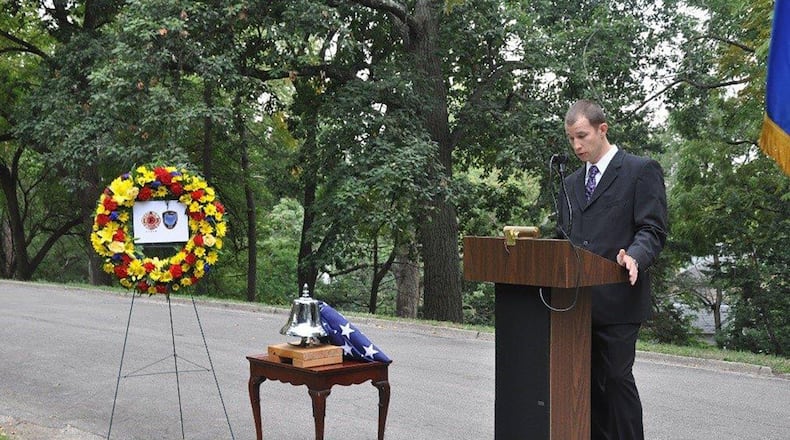 Capt. Steven McKee, civilian firefighter at Wright-Patterson Air Force Base, speaks at the Feb. 7 rededication ceremony for Wright Field Firefighter Frank. A. Smith at Woodland Cemetery in Dayton. The rededication ceremony was held to replace the formerly unmarked gravesite of Smith, who was killed in the line of duty as a result of injuries sustained while responding to an installation fire on Sept. 15, 1932. (Courtesy photo)