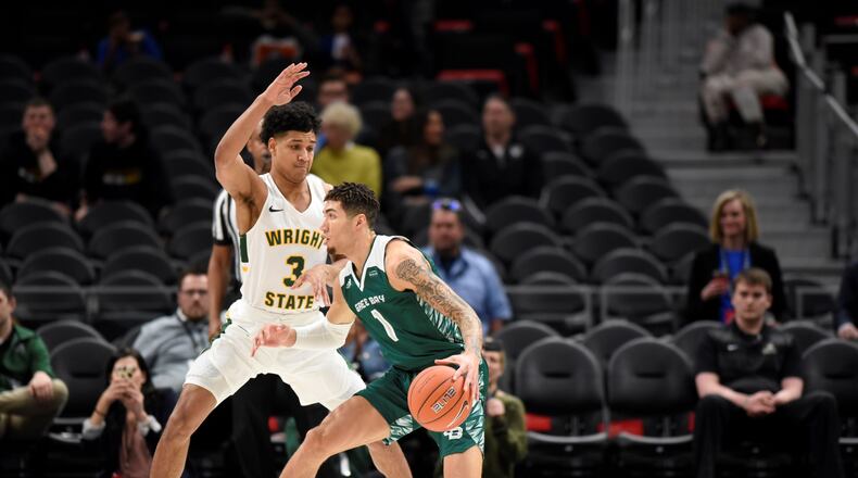 Mark Hughes (3 in white) and the Raiders are the No. 1 seed in the Horizon League tournament.