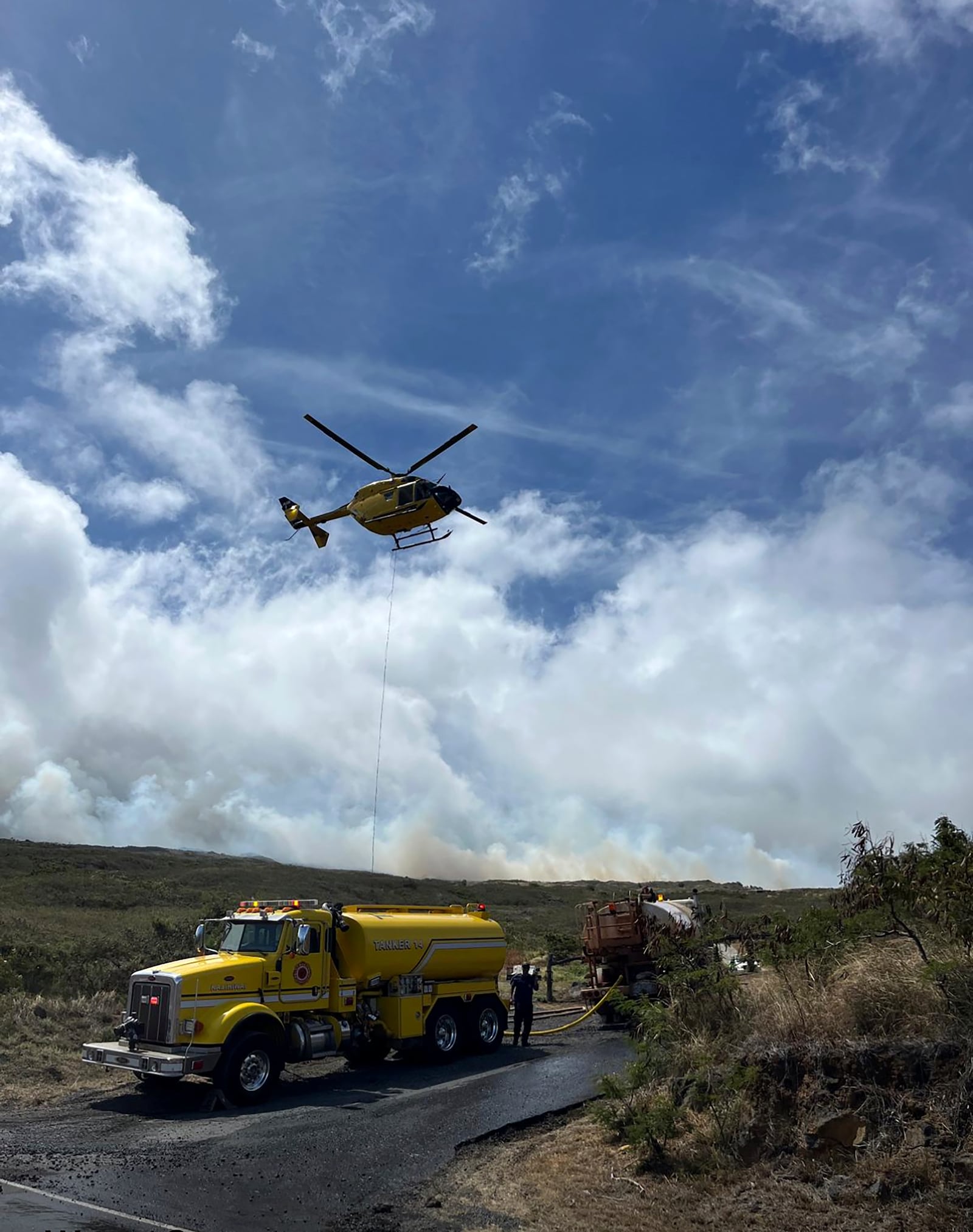 This photo provided by the Maui Fire Department shows smoke from a fire burning in Kahikinui, Hawaii on the island of Maui on Sunday, June 15, 2025. (Maui Fire Department via AP)