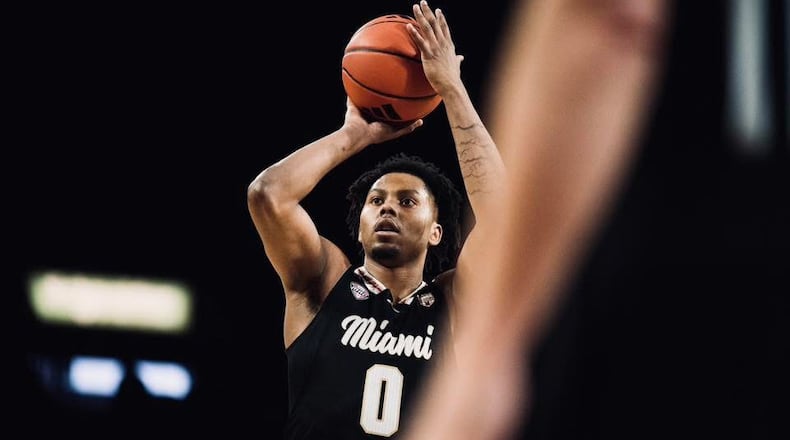 Miami’s Eian Elmer puts up a free throw against Akron on Saturday at Millett Hall. JORDAN PHILLIPS / CONTRIBUTED