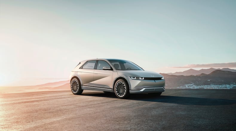 This photo provided by Hyundai shows the Ioniq 5, a new electric SUV that debuts in fall 2021. It packs the interior room of a midsize SUV, even though it's no longer than a compact crossover (Courtesy of Hyundai Motor America via AP)