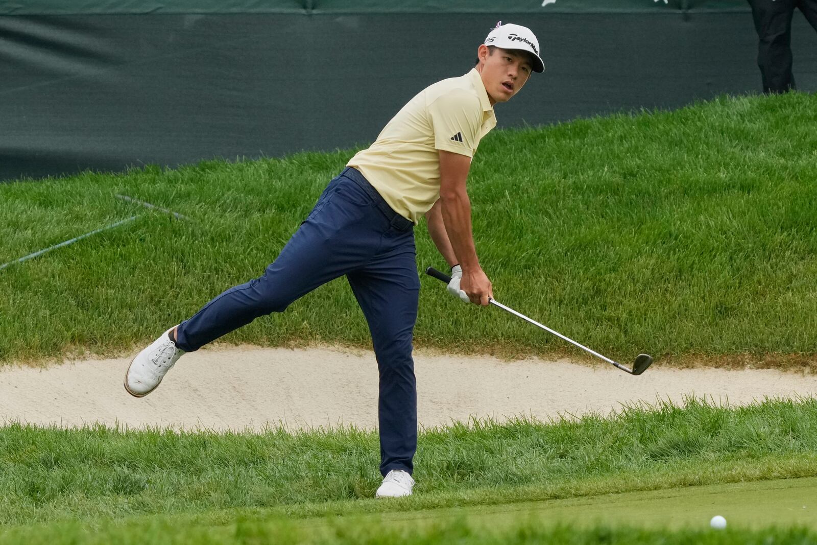 Collin Morikawa reacts after hitting onto the 13th green during the second round of the Memorial golf tournament Friday, May 30, 2025, in Dublin, Ohio. (AP Photo/Sue Ogrocki)