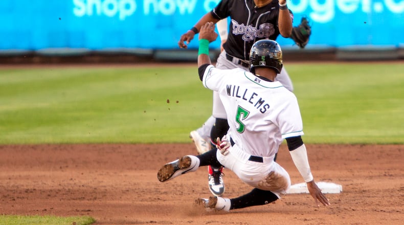 Dayton's Jonathan Willems attempts to steal second base in a game last week against Lansing. An experimental rule in High-A leagues eliminating certain pickoff moves is meant to increase base stealing. Jeff Gilbert/CONTRIBUTED