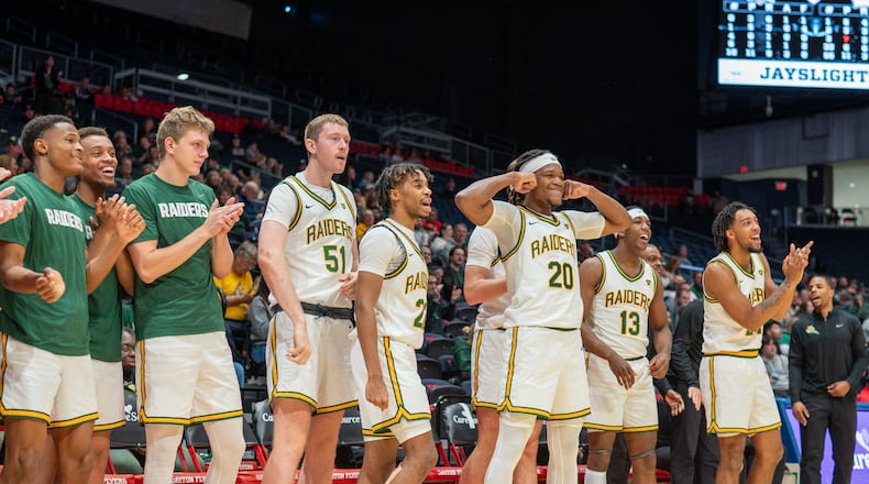 The Wright State University men's basketball team celebrates during their exhibition game against Ohio University on Oct. 10, 2025 at UD Arena. NICK PHILLIPS / CONTRIBUTED PHOTO