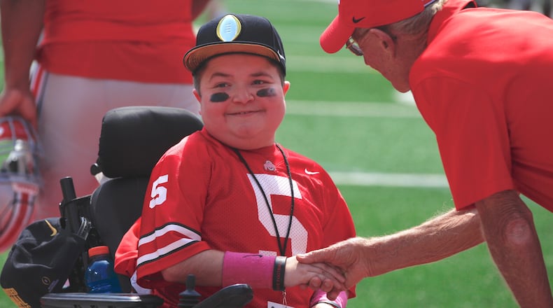 Jacob Jarvis smiles after scoring a touchdown in the Ohio State spring game on Saturday, April 15, 2017, at Ohio Stadium in Columbus. David Jablonski/Staff