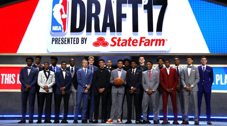 NEW YORK, NY - JUNE 22: Front Row (L-R) - OG Anunoby, Dennis Smith, Malik Monk, Luke Kennard, Lonzo Ball, Markelle Fultz, De'aaron Fox, Frank Ntilikina, Justin Jackson, Back Row (L-R) Bam Adebayo, Jonathan Isaac, Justin Patton, Lauri Markkanen, Jayson Tatum, Josh Jackson, Zach Collins, Donovan Mitchell and TJ Leaf pose before the first round of the 2017 NBA Draft at Barclays Center on June 22, 2017 in New York City. NOTE TO USER: User expressly acknowledges and agrees that, by downloading and or using this photograph, User is consenting to the terms and conditions of the Getty Images License Agreement. (Photo by Mike Stobe/Getty Images)
