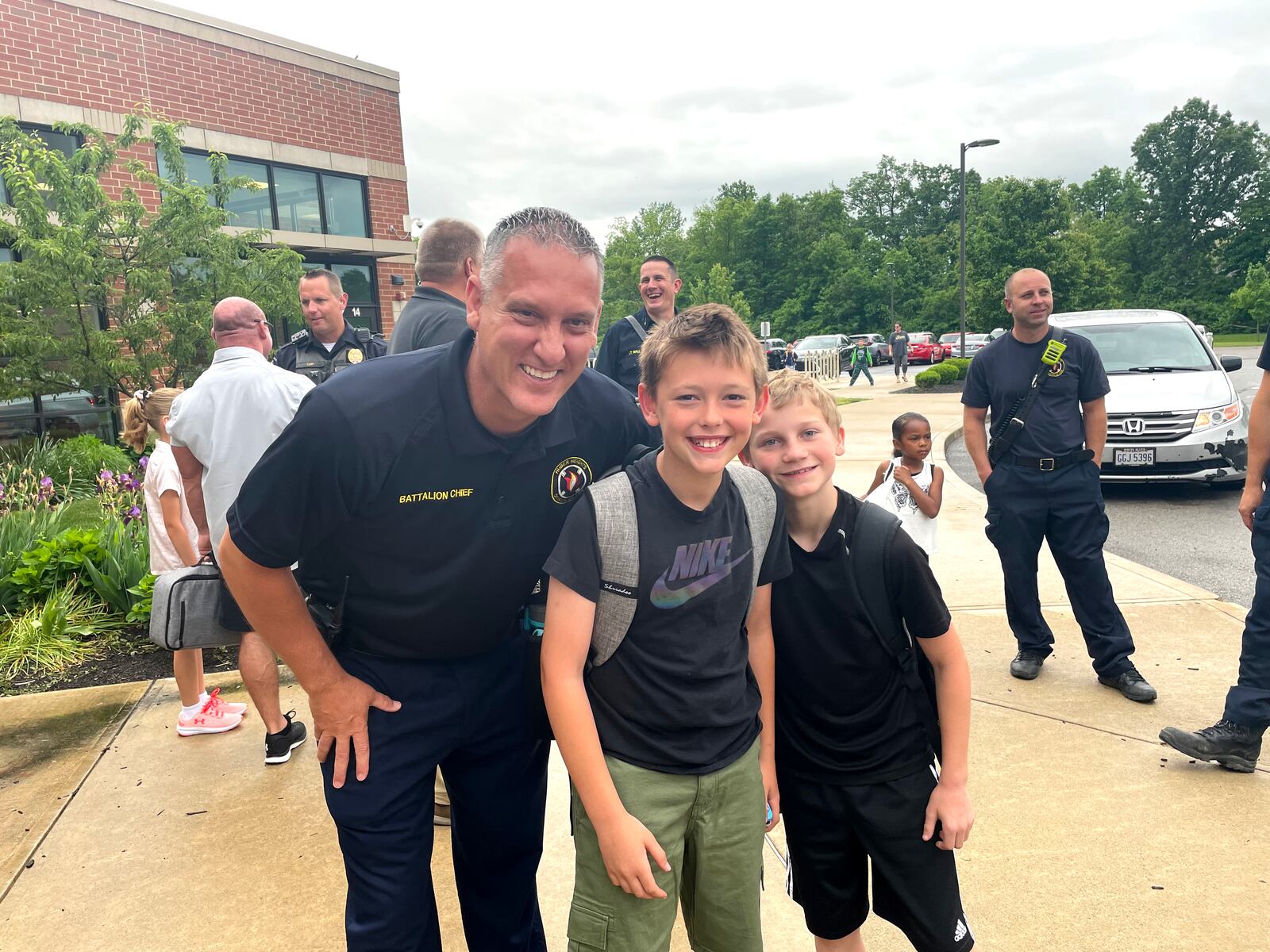 Huber Heights Fire Division Administrative Battalion Chief John Russell, with students at Charles Huber Elementary.