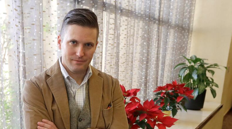 In this 2016 photo, white nationalist Richard Spencer poses between interviews in College Station, Texas. A University of Cincinnati spokesman said Thursday, Sept. 28, 2017, that the school was assessing “safety and logistical considerations” in considering Spencer’s request to speak there, WCPO-TV reports, after Ohio State University and other colleges rejected similar requests. (AP Photo/David J. Phillip, File)