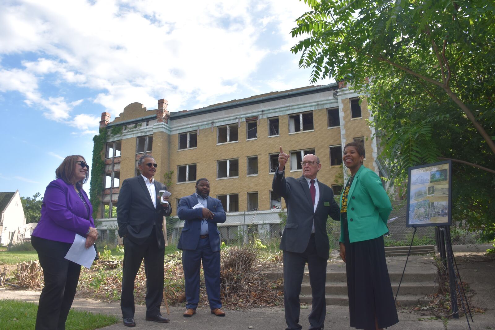 Fout Hall demolition began on Wednesday, June 12, 2024, on the Omega Baptist Harvard campus in northwest Dayton. From left, Montgomery County Commissioner Carolyn Rice; Alonzo Patterson, chair of Omega CDC board of trustees; Rev. Joshua Ward with Omega Baptist Church; Kent Millard, president of United Theological Society; and Vanessa Ward, president of Omega CDC.