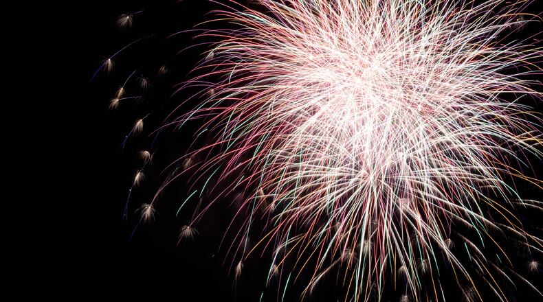 Beavercreek was one of the local communities that went ahead with fireworks in 2020 on July 4 in a new setting at the Mall at Fairfield Commons that allowed people to watch the show from their vehicles. TOM GILLIAM/CONTRIBUTED