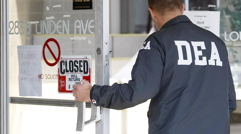 In October 2012, federal and state agents served a search warrant at the 2838 Linden Ave. office run by Dr. David Kirkwood and his wife. DEA agents were seen removing boxes. STAFF/File photo