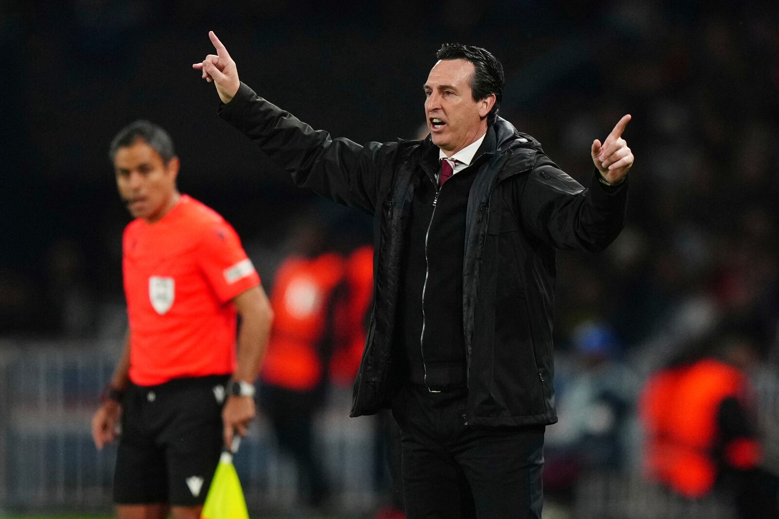 Aston Villa's head coach Unai Emery gestures during the Champions League quarterfinal first leg soccer match between Paris Saint-Germain and Aston Villa at Parc des Princes stadium in Paris, Wednesday, April 9, 2025. (AP Photo/Aurelien Morissard)