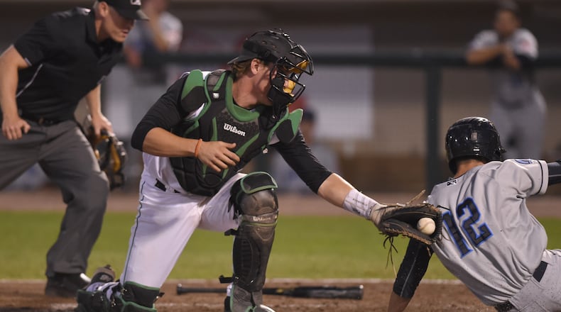Dragons catcher Tyler Stephenson tags out Nathan Lukes at the plate in the eighth inning of Tuesday nights game against Lake County at Fifth Third Field.
NICK FALZARANO/CONTRIBUTED