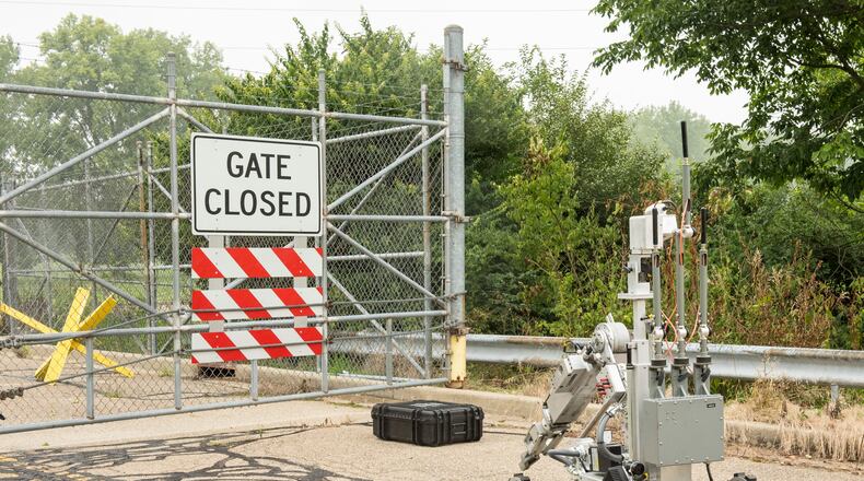 An F6A explosive ordnance detection robot approaches a suspicious object Aug. 10 during an active-shooter exercise at Wright-Patterson Air Force Base. The exercise was conducted to test the skills of first responders in a potential real-world scenario. U.S. AIR FORCE PHOTO/JAIMA FOGG