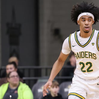 Wright State sophomore guard TJ Burch dribbles during a Horizon League game against Detroit Mercy on Thursday, Feb. 12 at Ervin J. Nutter Center in Fairborn. BRYANT BILLING / STAFF