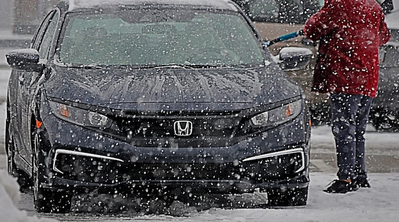 Dayton residents may have a little more time to get their children to school on snowy days, now that two-hour delays are a possibility. MARSHALL GORBY/STAFF
