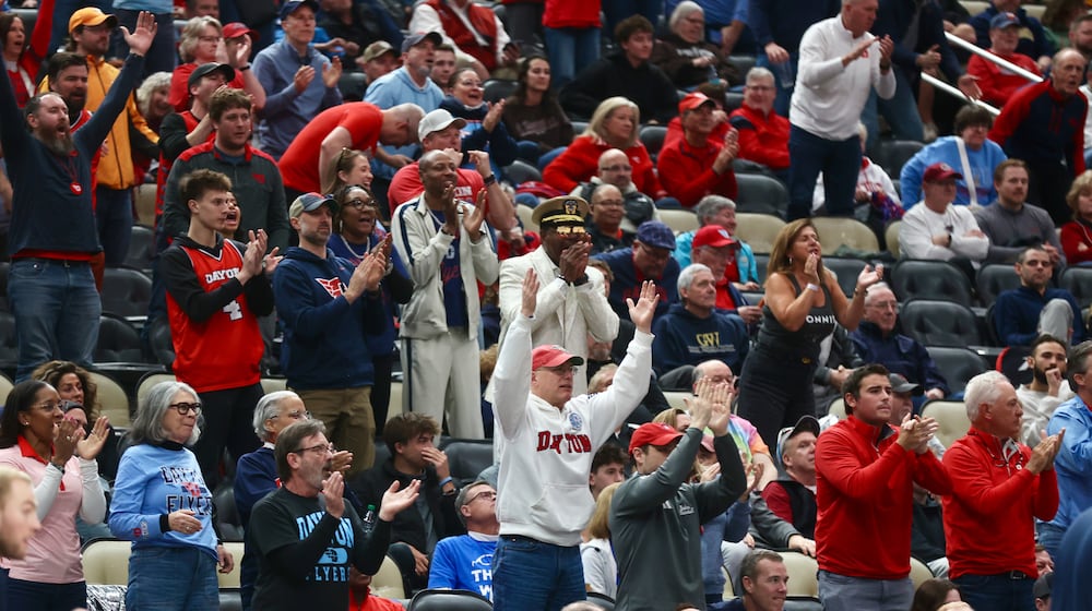 Dayton fans cheer during a game against St. Bonaventure in the quarterfinals of the Atlantic 10 Conference tournament on Friday, March 13, 2026, at PPG Paints Arena in Pittsburgh. David Jablonski/Staff