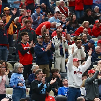 Dayton fans cheer during a game against St. Bonaventure in the quarterfinals of the Atlantic 10 Conference tournament on Friday, March 13, 2026, at PPG Paints Arena in Pittsburgh. David Jablonski/Staff