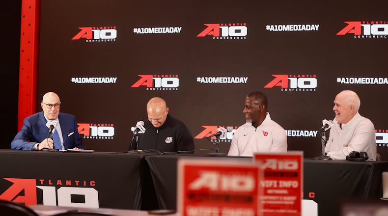 ESPN's Seth Greenberg moderates a panel discussion with Frank Martin, of Massachusetts, Dayton's Anthony Grant and St. Bonaventure's Mark Schmidt at Atlantic 10 Conference Media Day on Monday, Oct. 7, 2024, at District E next to Capital One Arena in Washington, D.C. David Jablonski/Staff