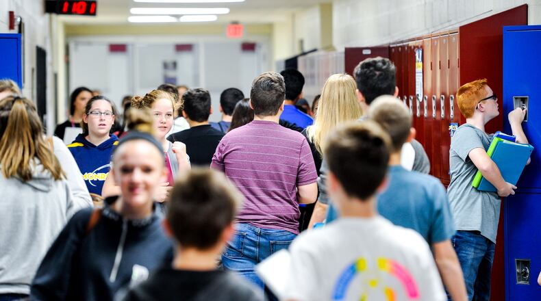 Students change classes in the junior high section of Monroe Junior/Senior High School Tuesday, Oct. 17 in Monroe. NICK GRAHAM/STAFF FILE