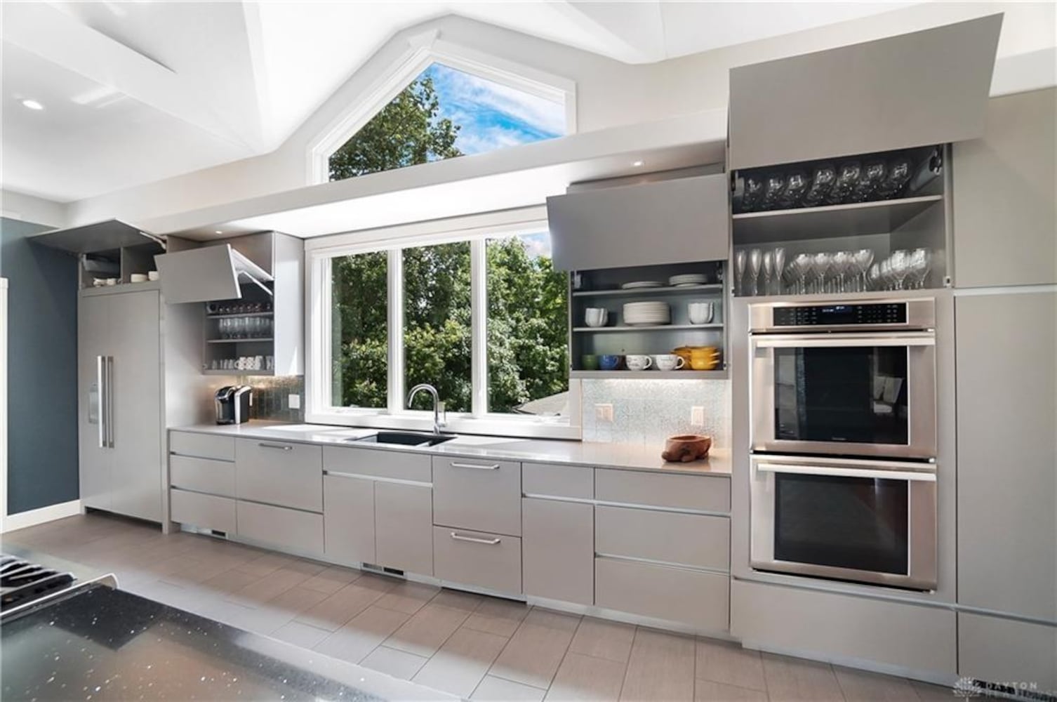 PHOTOS: Spectacular $1.8M luxury home on market with pool, golf simulator