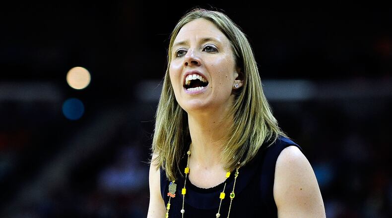 NEW ORLEANS, LA - APRIL 07: Lindsay Gottlieb, head coach of the California Golden Bears, instructs her team against the Louisville Cardinals during the National Semifinal game of the 2013 NCAA Division I Women’s Basketball Championship at New Orleans Arena on April 7, 2013 in New Orleans, Louisiana. (Photo by Stacy Revere/Getty Images)