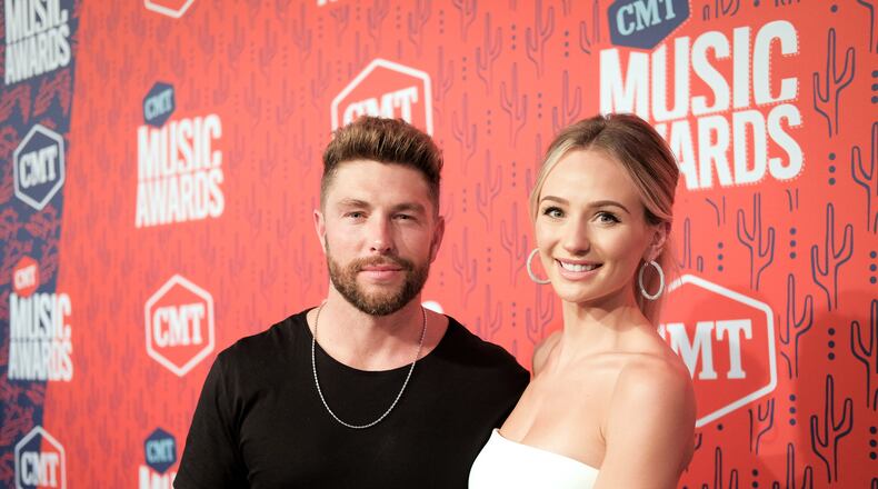 NASHVILLE, TENNESSEE - JUNE 05: Chris Lane and Lauren Bushnell attend the 2019 CMT Music Award at Bridgestone Arena on June 5, 2019 in Nashville, Tennessee. (Photo by Jason Kempin/Getty Images for CMT)