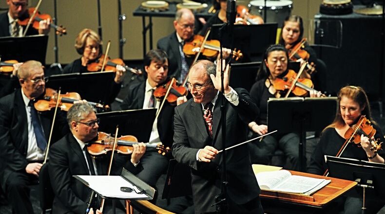 Neal Gittleman, conductor of the Dayton Philharmonic, performed at a Dayton Performing Arts Alliance announcement Wednesday, March. 4. MARSHALL GORBY / STAFF