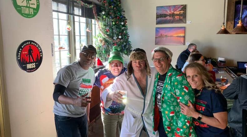 Alexis Larsen enjoying last year's Griswold Christmas Eve Brunch at Mudlick Tap House with friends and family and, of course, Cousin Eddie.
