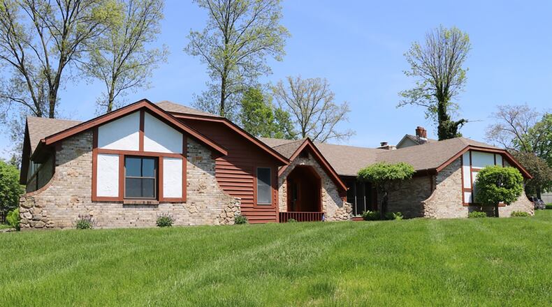 The main social areas of this 4-bedroom ranch were completely renovated in 2018. A cathedral ceiling peaks over the open formal areas and more casual morning room. The kitchen has custom cabinetry, mosaic-glass backsplash and granite countertops. CONTRIBUTED PHOTOS BY KATHY TYLER