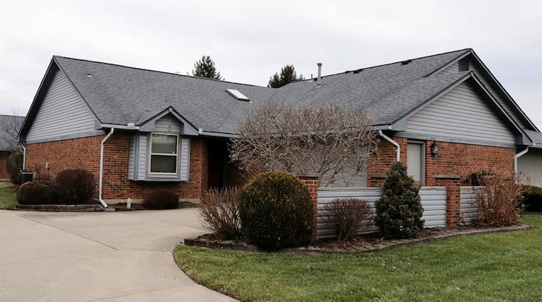 The brick ranch has about 1,350 sq. ft. of living space. The unit is one of two attached and has extra off-street parking, a 2-car garage and a concrete patio nestled among mature trees. CONTRIBUTED PHOTO BY KATHY TYLER