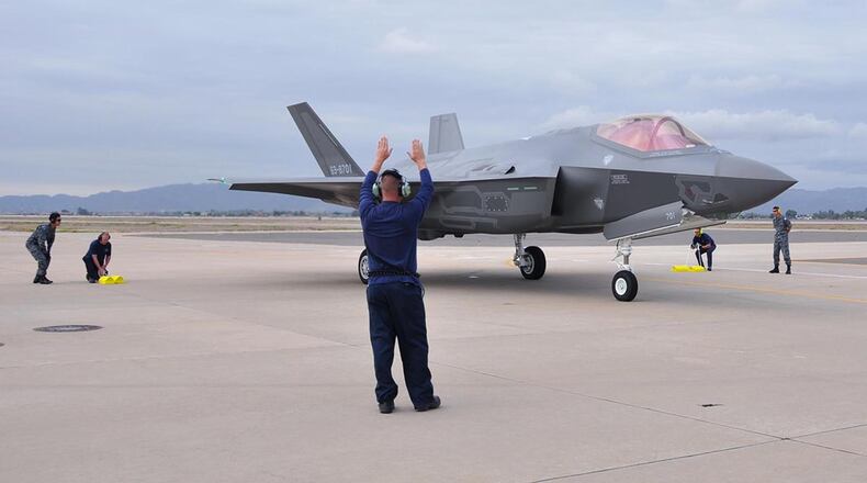 Lockheed Martin and Japanese Air Self-Defense Force personnel work together to taxi in the arrival of the first foreign military sales F-35A onto the 944th Fighter Wing ramp Nov. 28, 2016, at Luke Air Force Base, Ariz. The arrival marked the next step for the international F-35 training program. (U.S. Air Force photo/Tech. Sgt. Louis Vega Jr.)