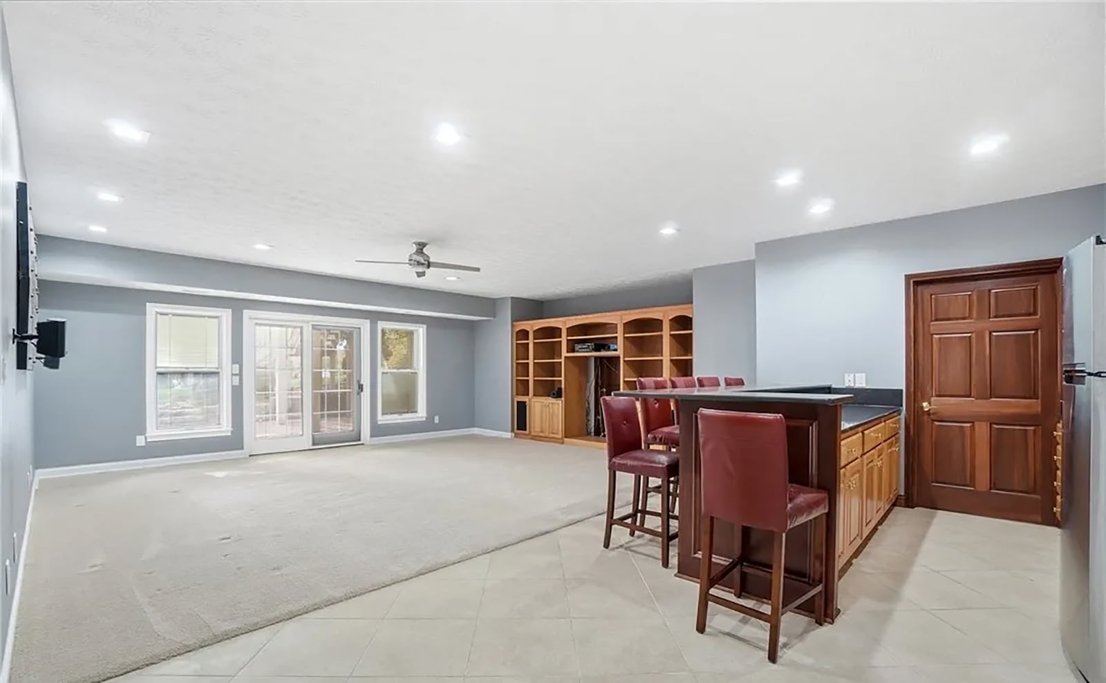 The finished walk out basement has a recreation room with a built in entertainment center, wet bar, and two bedrooms (with egress) that share a Jack and Jill style bathroom. CONTRIBUTED