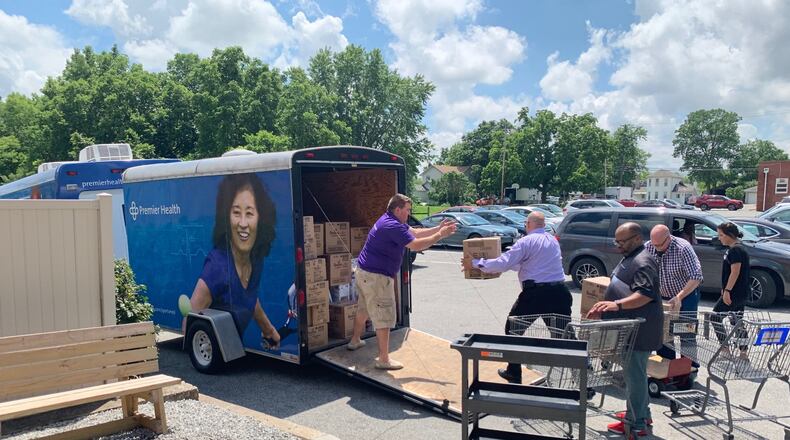 Premier Health employees deliver donated supplies to to Ginghamsburg Church. CONTRIBUTED