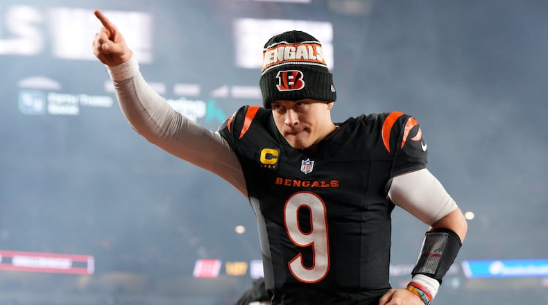 Cincinnati Bengals quarterback Joe Burrow (9) celebrates after an NFL football game against the Denver Broncos in Cincinnati, Saturday, Dec. 28, 2024. (AP Photo/Jeff Dean)