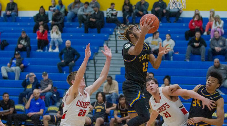 Ponitz senior Dayjaun Anderson scored 30 points Wednesday night to lead the Panthers to a sectional tournament victory over Bellefontaine at Springfield High School. CONTRIBUTED/Jeff Gilbert