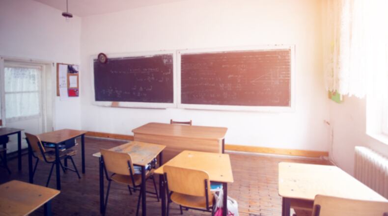 Classrooms in the 1990s were beginning to move to wipe-erase boards versus chalkboards, and now have smartboards and digital screens. ISTOCK