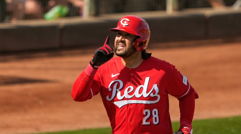 Cincinnati Reds' Eugenio Suárez celebrates his home run against the Kansas City Royals during the fifth inning of a spring baseball game in Goodyear, Ariz., Tuesday, Feb. 24, 2026. (AP Photo/Chris Carlson)